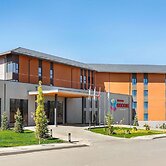 Ramada Encore By Wyndham Zomin