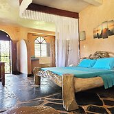 Room in Guest Room - Dolphin Suite 40 m2 in Villa 560 m2, Indian Ocean