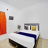 SPOT ON 92452 Griya Sandi Residence Family NearPantai Boom