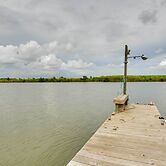 Golden Meadow Getaway: Waterfront Retreat w/ Deck