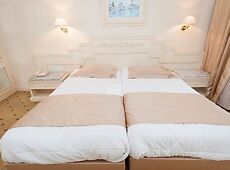 room.images[0].caption