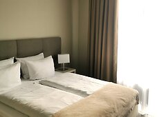 room.images[0].caption