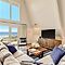 Roomy Chalet-Style Beachfront Condo with Private Beach Access by RedAw
