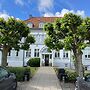 Sixtus Sinatur Hotel og Konference