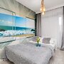 Beach Wave Apartment by Renters Prestige