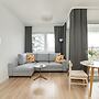 Gray Cosy Studio in Poznań by Renters