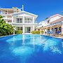 Beachfront 7BR Villa with Pool & Maid