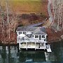 Unique Smith Mountain Lake Home Over Water w/ Dock