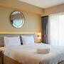 Homey And Cozy Living Studio At Tamansari The Hive Apartment