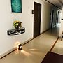 iROOMZ Sree Hotel Suncity