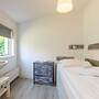 Cozy Holiday Home 3 Minutes From the Beach!