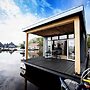 Modern Houseboat With View of the Lake