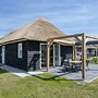 Thatched Villa in a Holiday Park