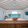 Touch Of Class Cottage: Beachfront Oasis
