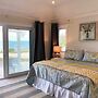 Oceanfront Elegance: New Home With Dock, Kayaks, And Pool