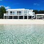 Secluded Luxury: New Beachfront Home With Pool