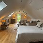 Cozy Studio Attic Retreat in Bettws Newydd