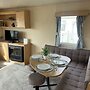 Lovely Caravan Located in an Amazing Holiday Park