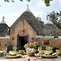 Trulli Mimosa by Pugliadamare