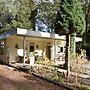 A Detached Bungalow With Outdoor Fireplace, Covered Terrace and Pond i