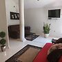 Room in Apartment - Cozy Mérida Retreat With Pool & Garden View