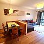Apartment With Balcony and Mountain Views