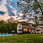 Family Fun Oasis Hot Tub Steam Room Pool Stream Firepit Games