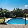 Red Villa With Shared Pool and Private Garden is the new Black on Lake