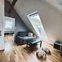 Apartment With Loft and Window Balcony