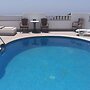 HOLIDAY HOME EMBLEMA
