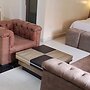 ADJ ROYALTY HOTELS & SUITES LTD