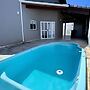 Casa com piscina em Bertioga 1