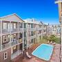 Serenity by the Sea! 4BR Retreat, Sleeps 12, Walk to Beach & Community
