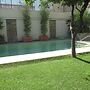 Apartamento Bizcocheros con piscina y jardin