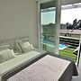 The White Apartment With Pool
