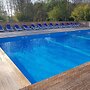 Camping Le Petit Lion - Lodges Bois