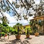 Belvilla by OYO Plush Farmhouse With Swimming Pool