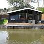 Modern Chalet in a Small Park With a Fishing Pond