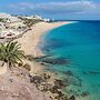 Apartment Near the Beach With a Huge Terrace Patio, Wifi and Parking
