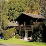 Cozy Chalet With Fireplace, Located in Wooded Area