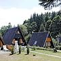 Wooden Chalet with Terrace near Swimming Lake