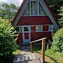 Wooden Bungalow With a Terrace, in a Wooded Area