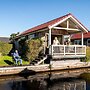 Cozy Chalet Right on the Water in Friesland