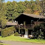 Tidy Chalet With Fireplace, Located in Wooded Area