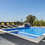 Villa with Swimming Pool, Outdoor Kitchen, Sauna, Hot Tub, Play Area, 