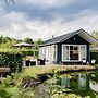 Beautiful Chalet in a Holiday Park by a Pond