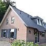 Spacious Farmhouse with Barbecue near Veluwe