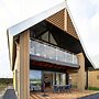 Modern Lodge on the Water in a National Park