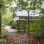 Cozy House With a Fireplace in a Holiday Park in a Natural Area