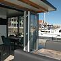 Beautiful Houseboat in the Harbour of Volendam Near Centre